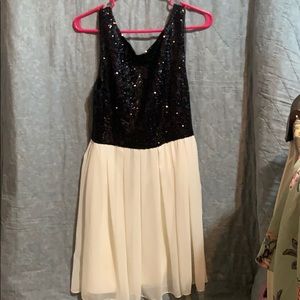 Black Sequin Dress with cream colored Tool skirt.